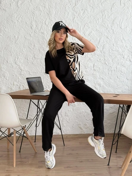 Kadın Bisiklet Yaka Kısa Kol Leopar Desen Bluz Ve Pantolon Ikili Takım ürün görseli