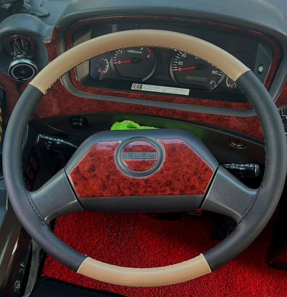 DİKİŞLİ DİREKSİYON KILIFI BEJ DERİ SİYAH DERİ SİYAH DİKİŞLİ ISUZU NOVO LUX 2013 KASA İÇİN ürün görseli