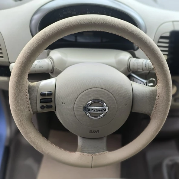 DİKİŞLİ DİREKSİYON KILIFI BEJ DERİ BEJ DİKİŞLİ NİSSAN MİCRA İÇİN ürün görseli