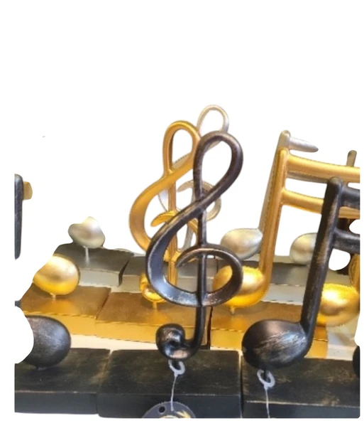 10cm-20cmlik ebatlarda kırılmaz polyester SARI RENK,nota desenli biblo - Resim 7