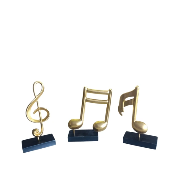 10cm-20cmlik ebatlarda kırılmaz polyester SARI RENK,nota desenli biblo - Resim 2