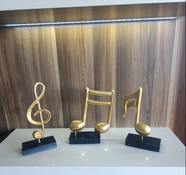 10cm-20cmlik ebatlarda kırılmaz polyester SARI RENK,nota desenli biblo - Resim 9