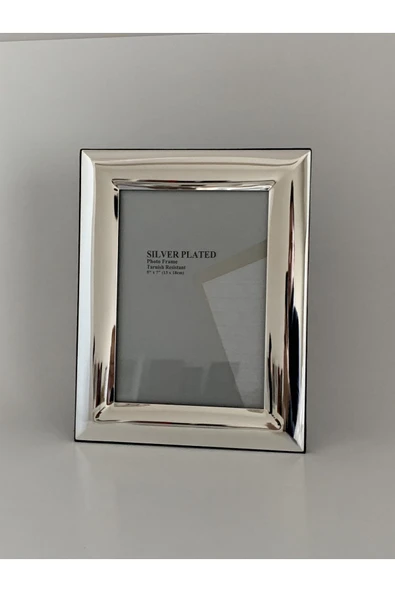 Yenigeldi Gümüş Çerçeve ( 13-18cm), Pürüzsüz ve Parlak. Kadife Sırt.
