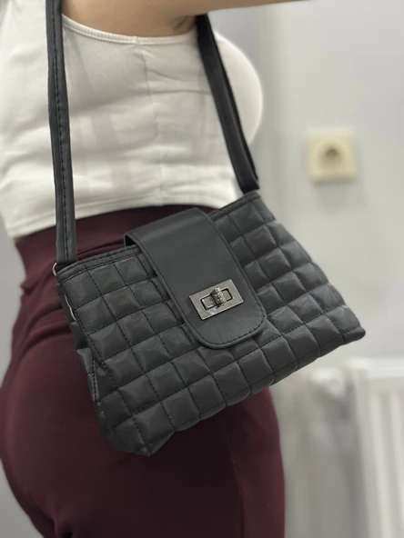 Kapaklı kapitone siyah cilt çanta ürün görseli 1