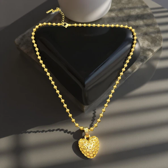 Kabartmalı Kalp Detay 316L Altın Renk Çelik Kolye – Aşkın Zamansız Simgesi ürün görseli 1