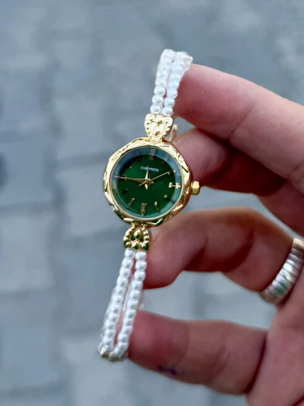Zümrüt Yeşili Gold Renk Kadın Kol Saati İnci Detaylı Şık Bileklik Tasarımı Zarif ve Klasik Aksesuar