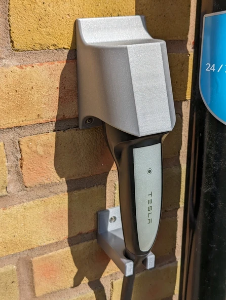Tesla şarj fişi tutucu (Plastik Aparattır!!!)