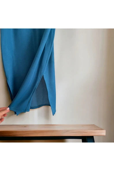 SUNA İKİ YANI YIRTMAÇLI KALEM ETEK-  DOKUMA PETROL