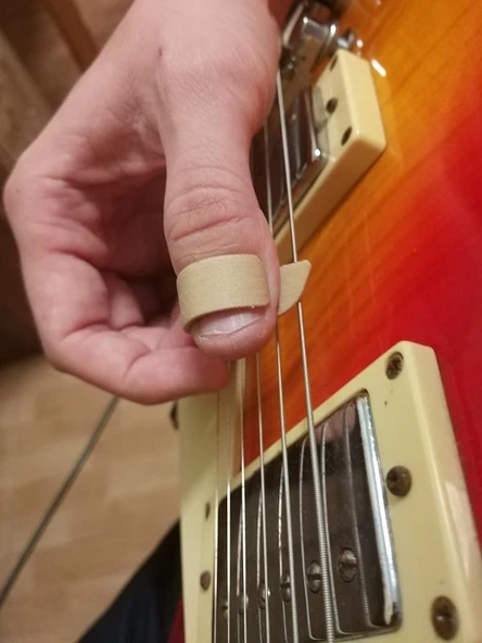 Gitar başparmak seçimi (Plastik Aparattır!!!)