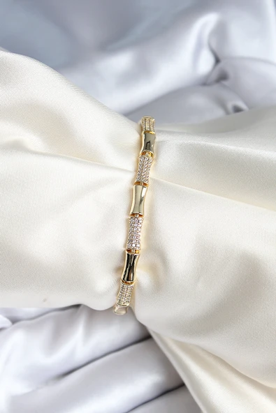 Pirinç Kemik Model Zirkon Taşlı Gold Renk Kadın Bileklik - TJ-BB6978