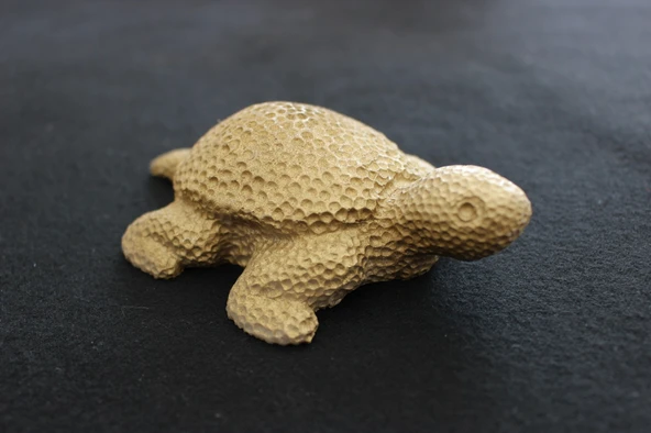 KAPLUMBAĞA HEYKELCİĞİ