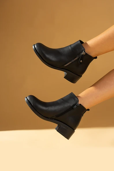 Pembe Potin Rahat Kalıp Bilek Boy Fermuarlı Kadın Bot 57-03-23Cilt ürün görseli