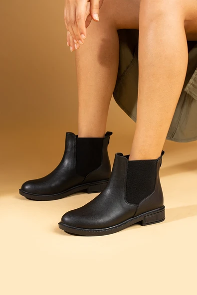 Pembe Potin Yanı Lastikli Sıcak Astar Bilekte Kadın Bot 57-109-24 ürün görseli