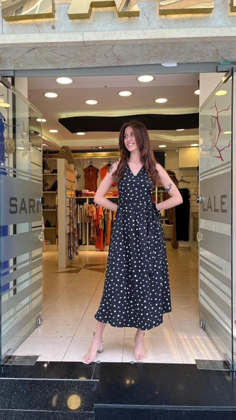 PUANTİYE DESENLİ ARKASI ÇAPRAZ BANTLI ELBİSE ürün görseli