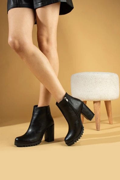 Pembe Potin Yuvarlak Burunlu Trak Tabanlı Orta Topuklu Fermuarlı Kadın Bot 51-404-23Cilt ürün görseli