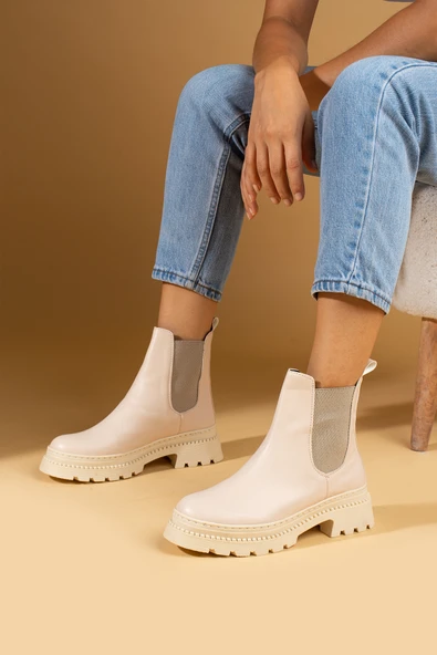 Pembe Potin Yanı Lastikli Yüksek Taban Sıcak Astar Bilekte Kadın Bot 57-66-24 ürün görseli