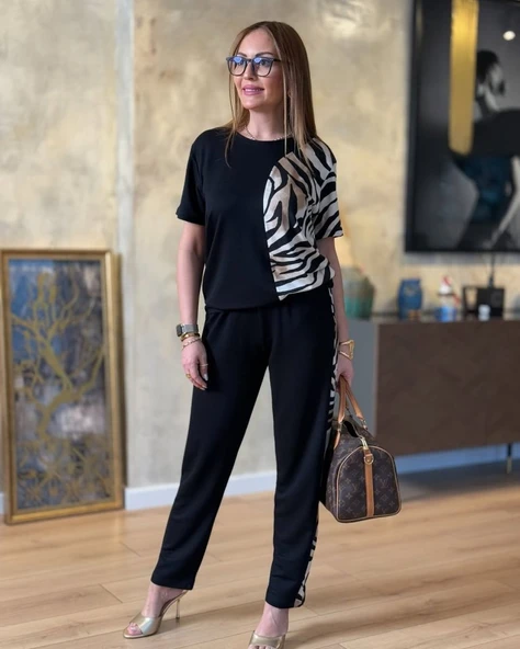 Kadın Bisiklet Yaka Kısa Kol Leopar Desen Bluz Ve Pantolon Ikili Takım ürün görseli 1