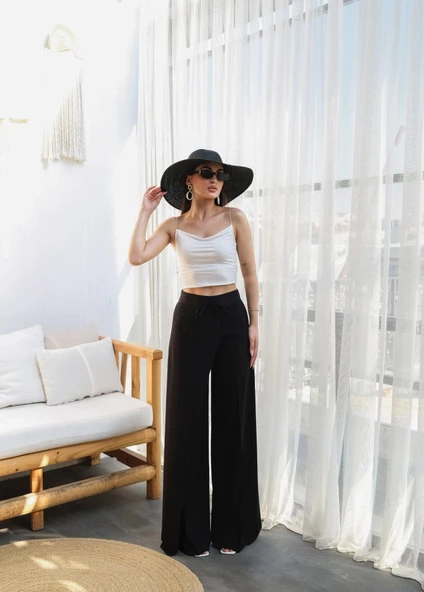 Keten Önü Çapraz Parçali Lasti̇kli̇ Ve Bağcikli Geni̇ş Paça Pantolon ürün görseli 1