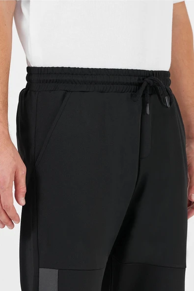 Erkek Siyah Standart Fit Normal Kesim Paça Ribanalı Cepli Rahat Jogger Eşofman Altı - Resim 4