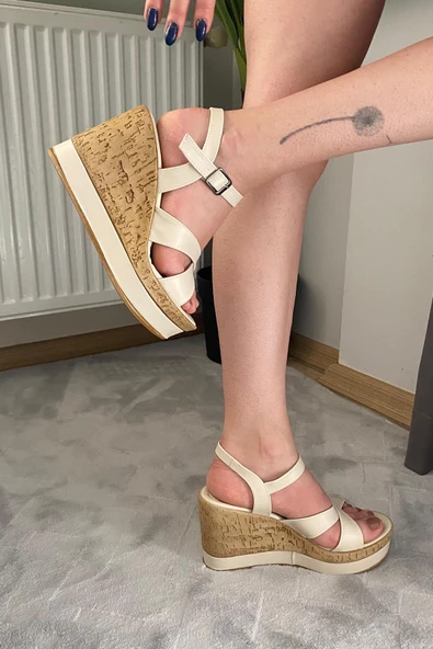 Kadın Demora Bej Cilt Çapraz Bant Dolgu Taban Ayakkabı ürün görseli