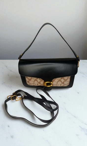 Kadın Ayarlanabilir Askılı Suni Deri Kapağı C Harfi Detaylı El ve Omuz Çantası ürün görseli 1