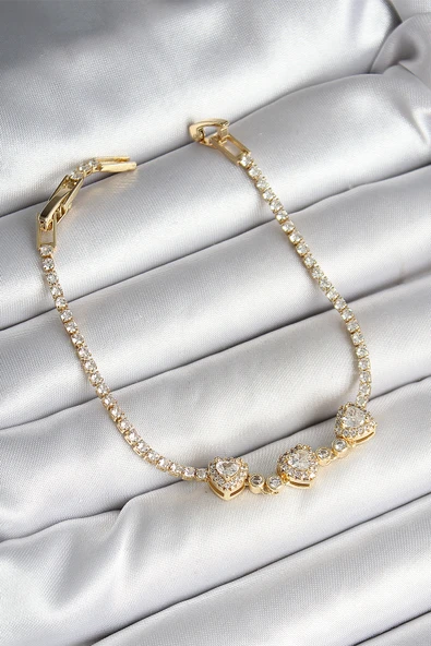 Pirinç Sıralı Kalp Figürlü Zirkon Taşlı Gold Renk Kadın Bileklik - TJ-BB6981 ürün görseli