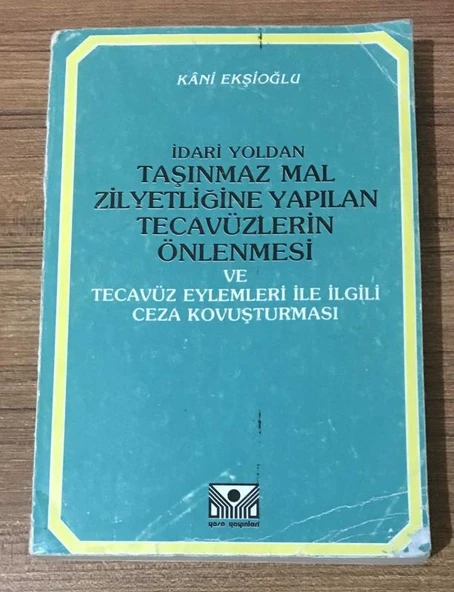 İDARİ YOLDAN TAŞINMAZ MAL ZİLYETLİĞİNE YAPILAN TECAVÜZLERİN ÖNLENMESİ VE TECAVÜZ EYLEMLERİ İLE İLGİLİ CEZA KOVUŞTURMASI (Sahafiye Kitap) ürün görseli 1