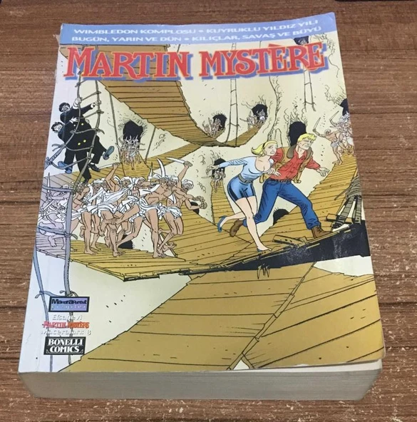 Efsanevi Martin Mystere Maceraları Cilt: 8 - Wimbledon Komplosu, Kuyruklu Yıldız Yılı Bugün, Yarın Ve Dün, Kılıçlar Savaş Ve Büyü - 1. Baskı (Sahafiye Kitap) ürün görseli 1
