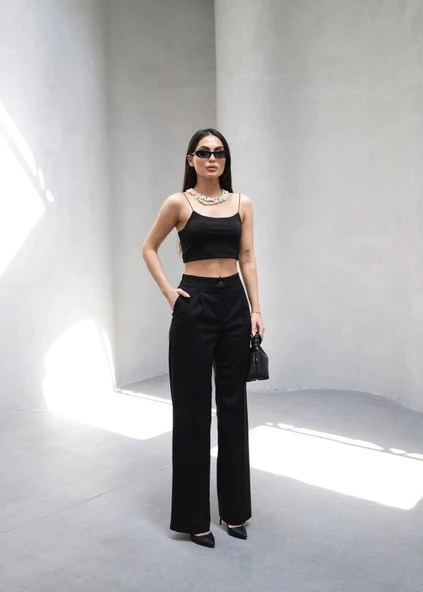 Arkasi Lasti̇kli̇ Pi̇leli̇ Dökümlü Wide Leg Pantolon ürün görseli