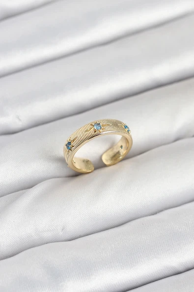 Pirinç Gold Renk Mavi Zirkon Taşlı Kutup Yıldızı Model Kadın Yüzük