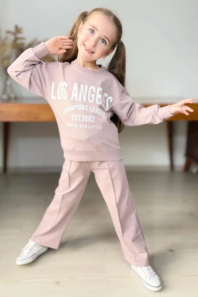Kız Çocuk Üzeri New Los Angeles Detaylı Bilekleri Manşetli Bol Kesim Pudra Eşofman Takım ürün görseli