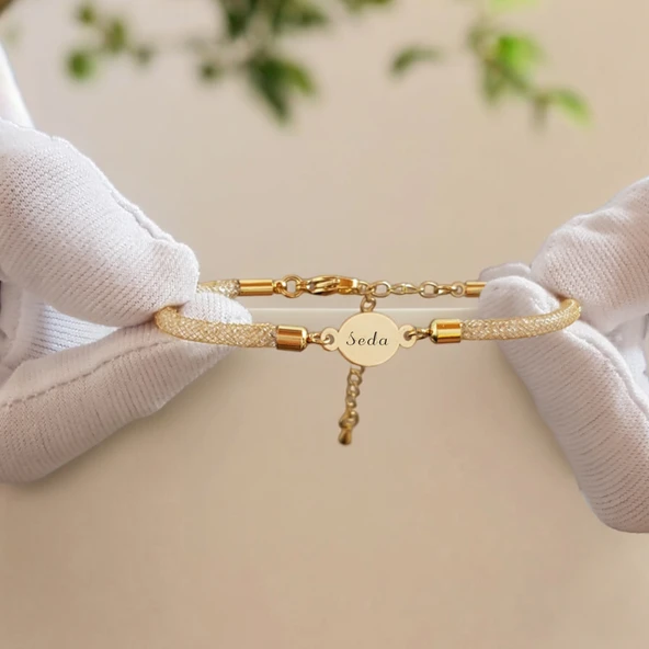 İsme Özel Oval Motifli Hasır Kordonlu 14 Ayar Altın Plakalı Doğum Günü Hediyesine Özel Bileklik-415 ürün görseli