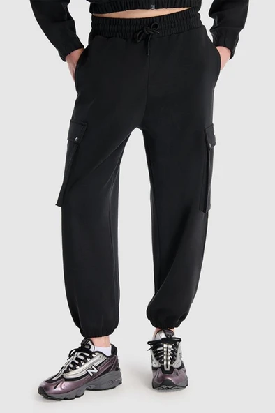 New Balance Lifestyle WNP1529-BK Siyah Kadın Eşofman Altı - 1