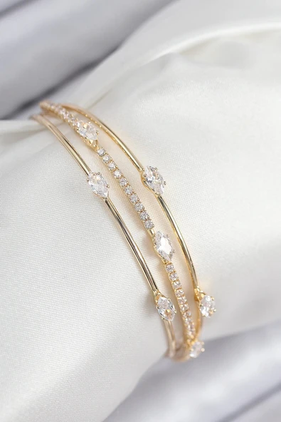 CEYLAN ADAM Pirinç Zirkon Taşlı Su Yolu Model Gold Renk Kadın Bileklik