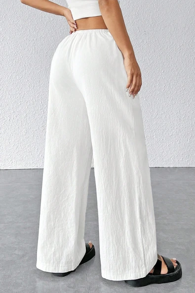 Kadın Beyaz Bol Kesim Cepli Geniş Paça Dökümlü Pantolon - Resim 2