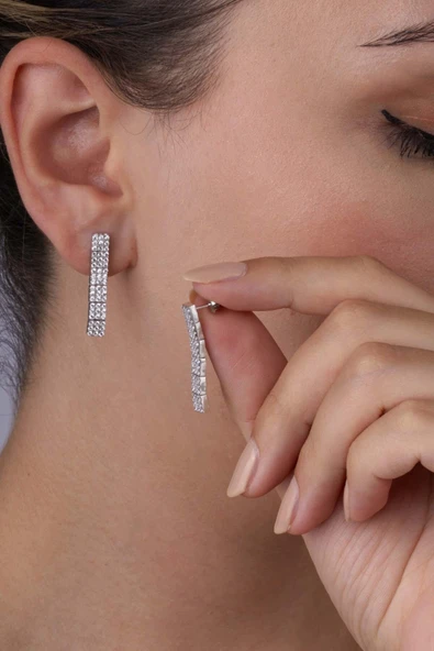 Gümüş Pazarım Beyaz Altın Kaplama Pırlanta Model Su Yolu Süzme 925 Ayar Gümüş Küpe ürün görseli 1