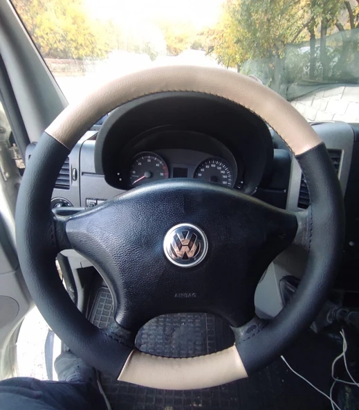 DİKİŞLİ DİREKSİYON KILIFI KREM DERİ SİYAH DERİ VW CRAFTER ÇIKINTISIZ DİREKSİYON İÇİN ürün görseli