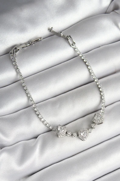 HEYF Pirinç Sıralı Kalp Figürlü Zirkon Taşlı Gümüş Renk Kadın Bileklik ürün görseli 1