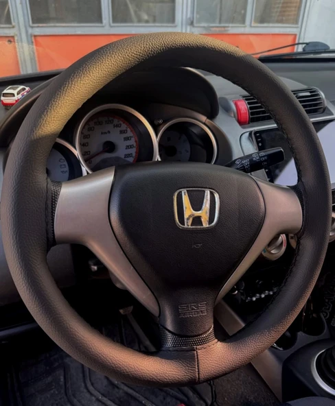 DİKİŞLİ DİREKSİYON KILIFI SİYAH DERİ SİYAH DİKİŞLİ HONDA JAZZ - CİTY İÇİN ürün görseli