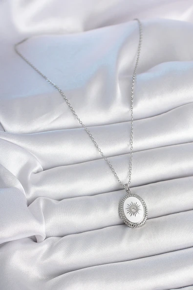 316L Çelik Gümüş Renk Beyaz Mineli Güneş İşlemeli Nazar Boncuk Detay Madalyon Model Kadın Kolye ürün görseli