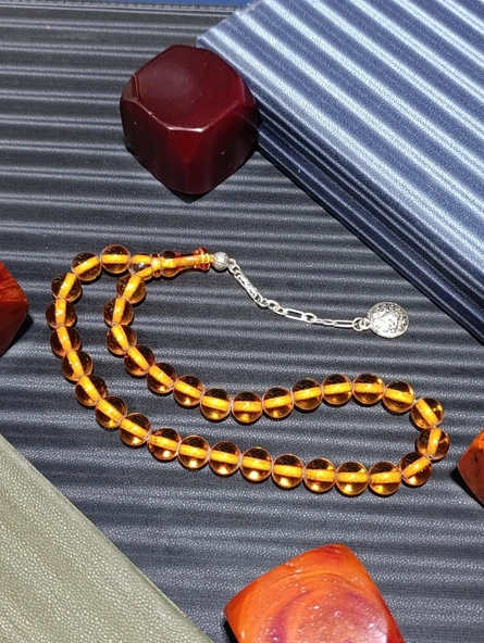  Şeffaf Zarafet: Bal Rengi Sıkma Çubuk Kehribar Tesbih ürün görseli