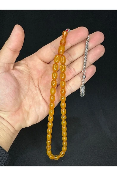 TOZ KEHRİBAR TESBİH SARI RENKLİ BEYZİ KESİM 11MMX8 MM T-575 ürün görseli