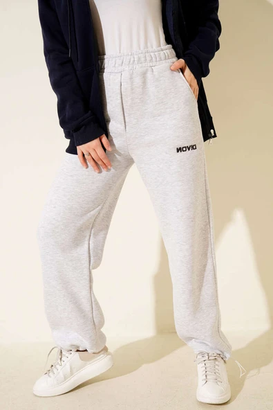 Bol Paça Lastikli Üç İplikli Pantolon Gri ürün görseli 1