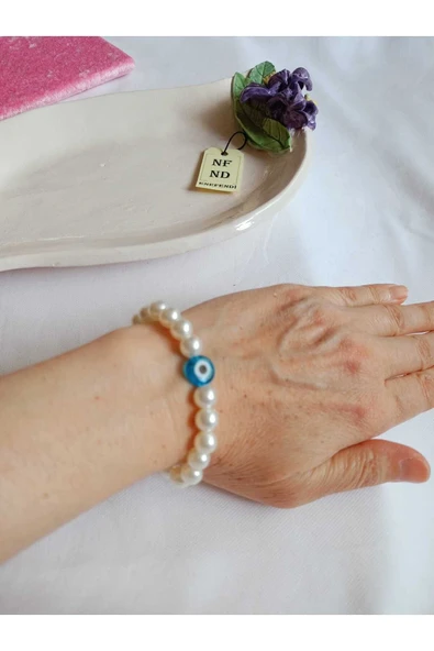 İNCİ BİLEKLİK NAZAR BONCUKLU (CAM) KREM RENK İNCİLİ BONCUK MİSİNA İPLİ ESNEK HEDİYE ürün görseli 1