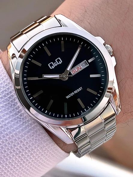 Q&Q Çelik Kordon Takvimli Kadran 2 Yıl Garantili 3 Atm Suya Dayanıklı Erkek Kol Saati QQ.E2001.A3 ürün görseli
