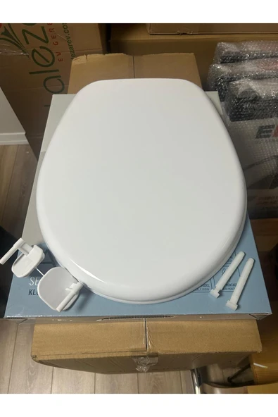 GenelTedarik Beyaz alttan sıkmalı klozet kapağı, dayanıklı ve şık tasarım ürün görseli 1