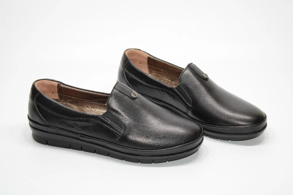 HANIMCA HAKİKİDERİ DÜZ TABAN YANI LASTİKLİ TOPUK DİKENİ JEL TABAN KADIN GÜNLÜK SİYAH RAHAT AYAKKABI