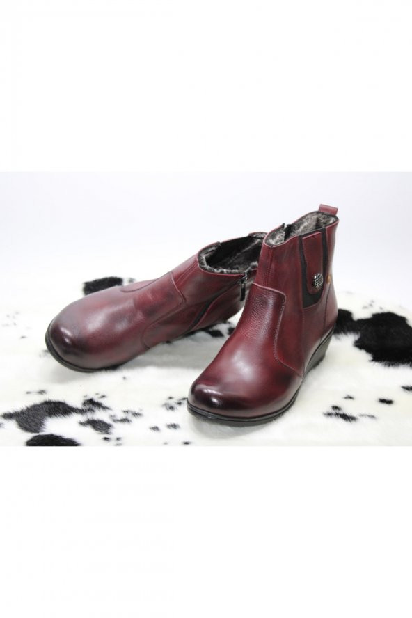 HAKİKİ DERİ ORTOPEDİK YANI LASTİKLİ DÜĞMELİ İÇİ YÜNLÜ FERMUARLI DOLGU TABAN BOT