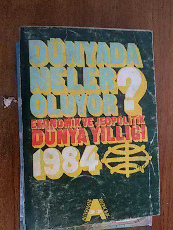 DÜNYADA NELER OLUYOR EKONOMİK VE JEOPOLİTİK DÜNYA YILLIĞI 1984  - KİTAP İKİNCİEL DİR