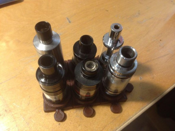 E-Sigara Atomizer Bir Bilmecenin Parçası Olarak Standı Plastik Aparat